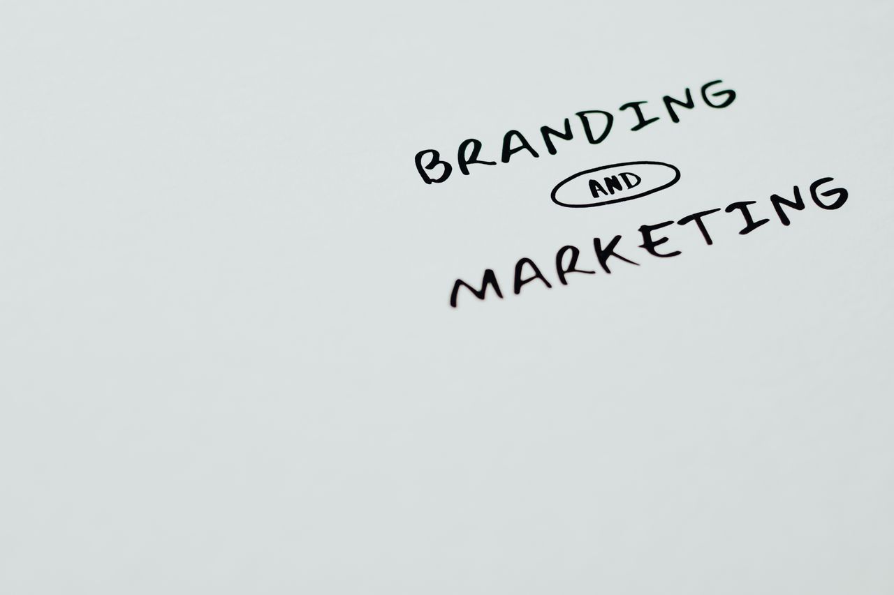 Crafting Captivating Headlines: Your awesome post title goes here A minimalist image featuring the words 'Branding' and 'Marketing' on a white background, ideal for digital marketing themes.